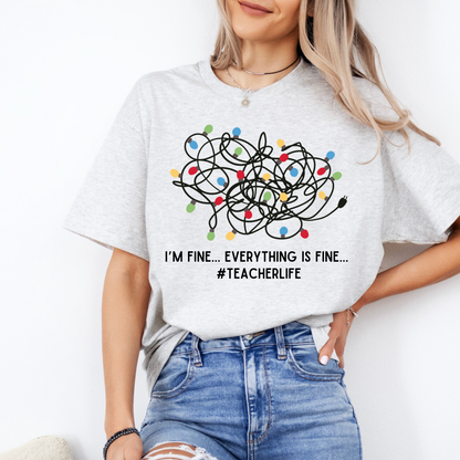 A woman wearing a white t-shirt with a graphic design and text printed on it.